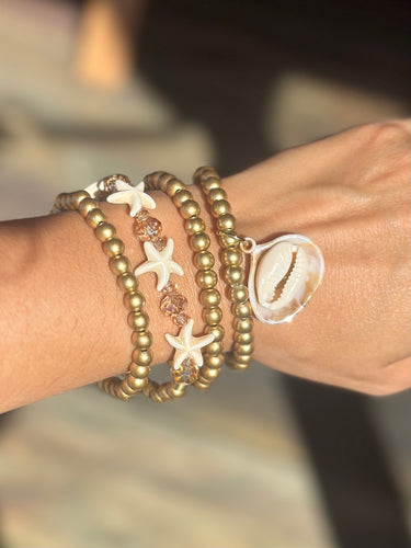 Pulsera estrella de mar dorada
